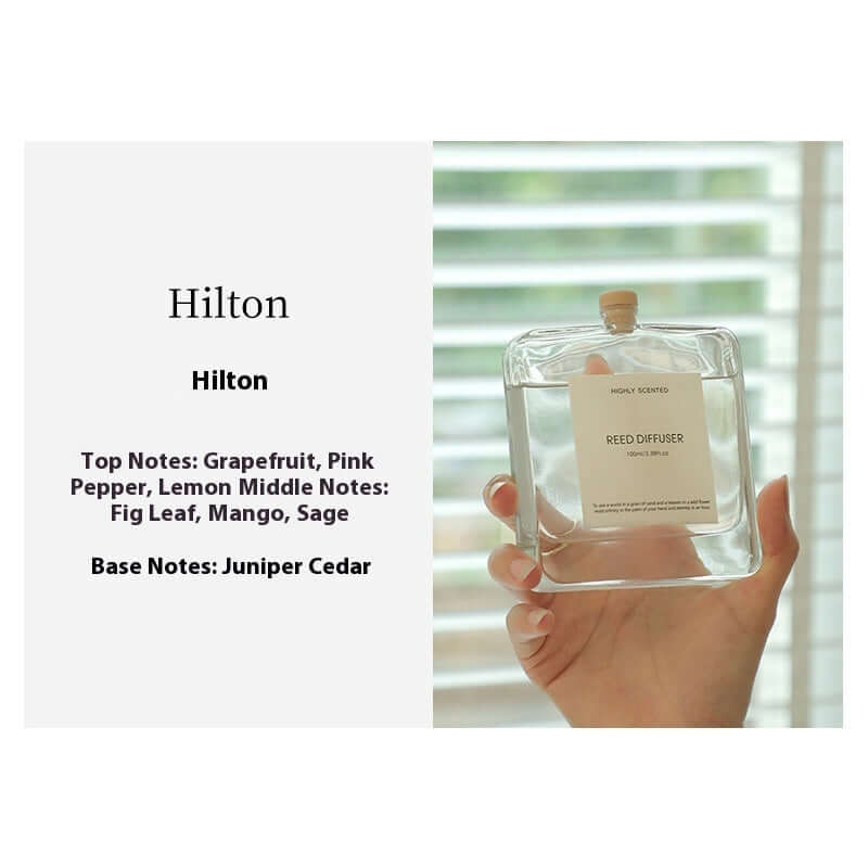 Plant-Inspired Indoor Bedroom Fragrance in a glass reed diffuser bottle with grapefruit and mango notes.